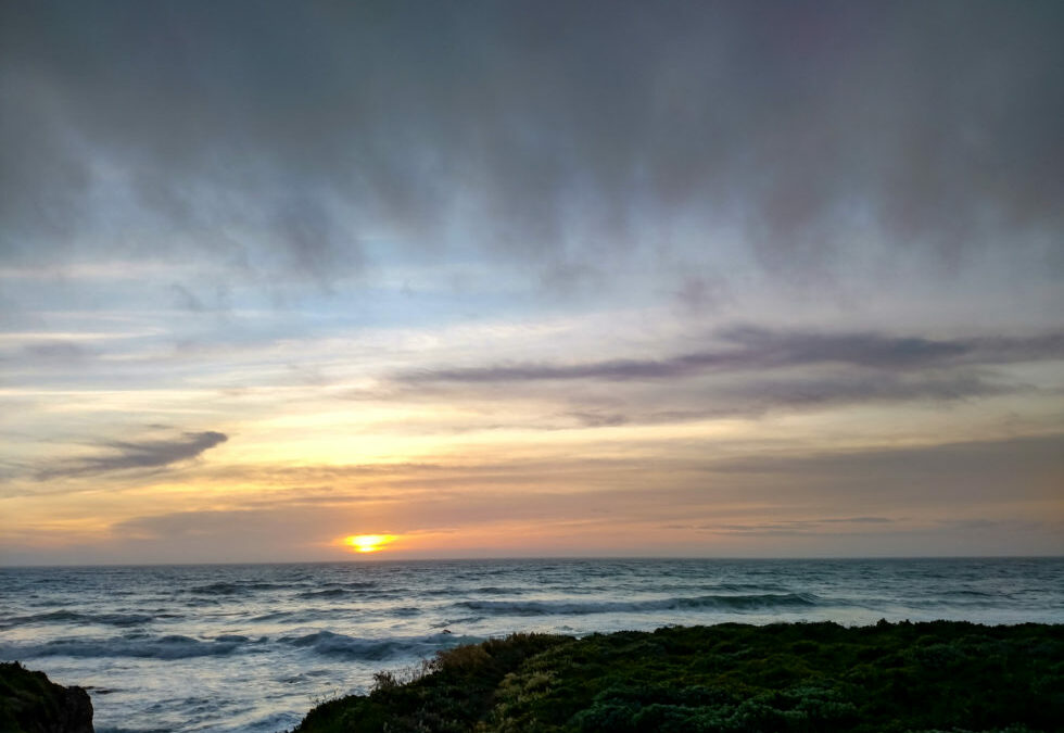 Solitude at Sunset : Reflection by the Sea