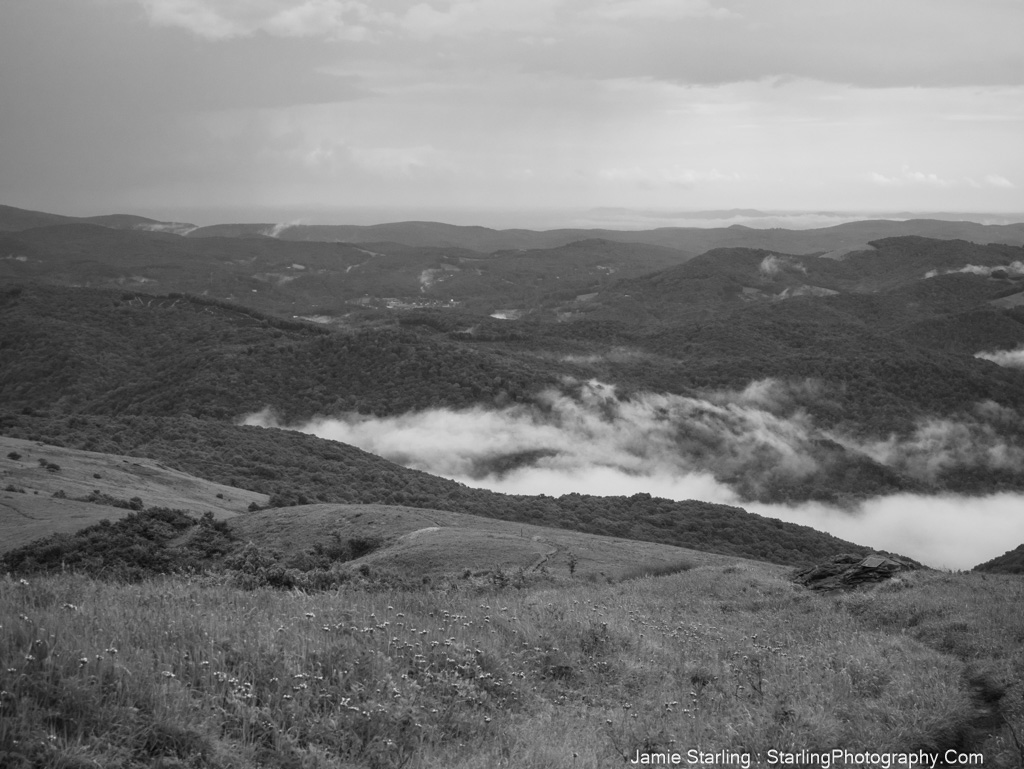 Misty Appalachian mountains with rolling hills, symbolizing life’s journey and the path to greater connection with nature.