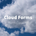 A video of fluffy white clouds against a bright blue sky in North Carolina, highlighting the beauty of cloud formations.